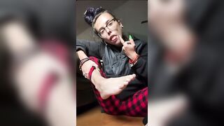 Feet: Chick with glasses sucking and spitting on her feet and toes #3