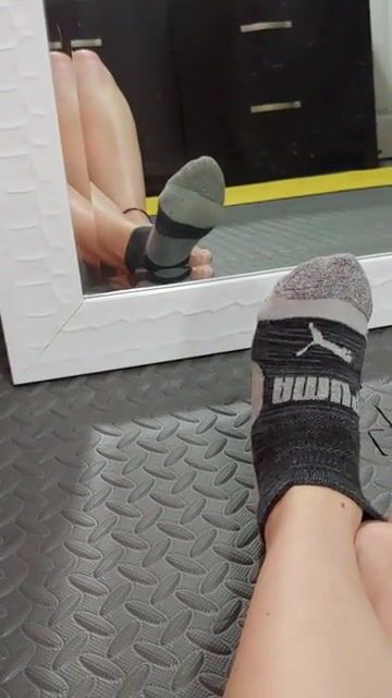 Taking off my dirty sock and foot stretch